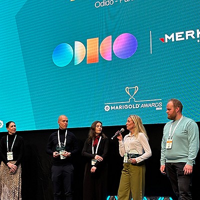 Merkle employees on stage receiving awards
